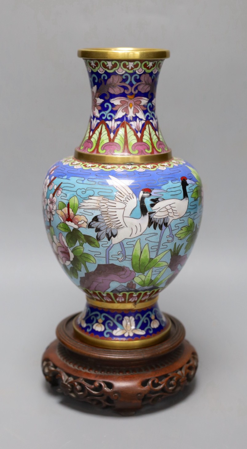 A Chinese cloisonné enamel vase, wood stand 32cm total height